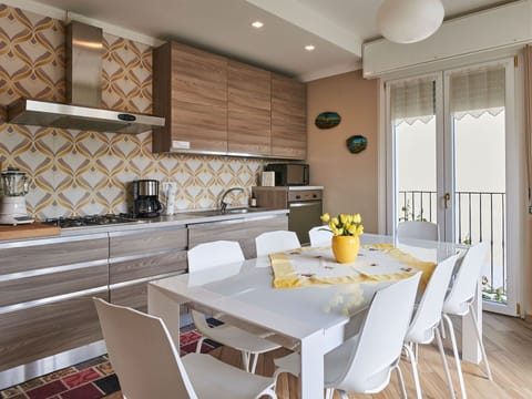 Table, Furniture, Property, Cabinetry, Countertop, Chair, Wood, Lighting, Kitchen, Window