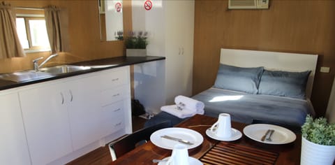 Standard Cabin, Shared Bathroom | Private kitchenette | Microwave, stovetop, electric kettle, toaster