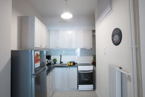 Apartment, 1 Bedroom | Private kitchen | Full-size fridge, microwave, stovetop, coffee/tea maker