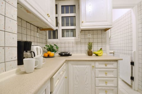 Apartment, 2 Bedrooms, Balcony | Private kitchen | Full-size fridge, oven, stovetop, coffee/tea maker