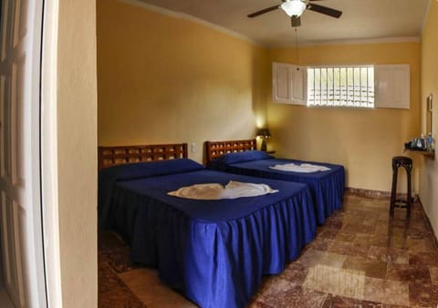 Deluxe Quadruple Room | In-room safe, individually decorated, individually furnished