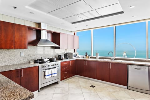 Premium Four-Bedroom Suite Sea View | Private kitchen | Coffee/tea maker, electric kettle, toaster