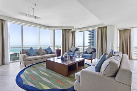Premium Four-Bedroom Suite Sea View | Living area | Smart TV