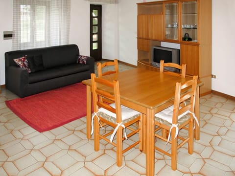 Furniture, Room, Property, Floor, Table, Interior Design, Living Room, Orange, Coffee Table, Building