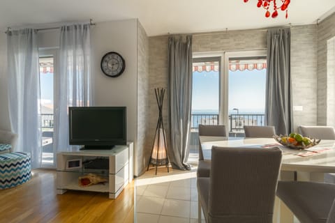 Apartment, 3 Bedrooms, Sea View | Living room | Flat-screen TV