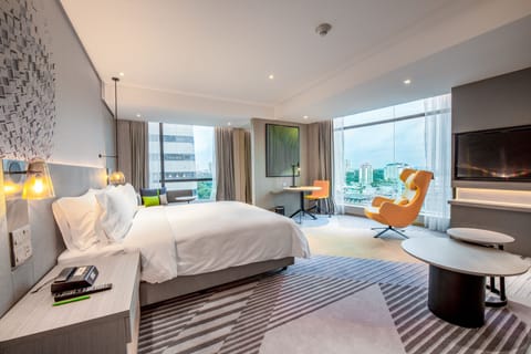 Suite, 1 King Bed, Sea View | Minibar, in-room safe, desk, laptop workspace