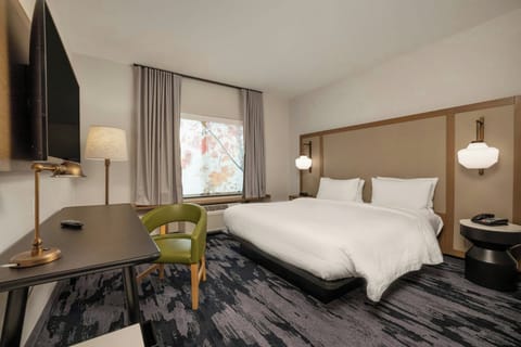 Desk, laptop workspace, blackout drapes, iron/ironing board