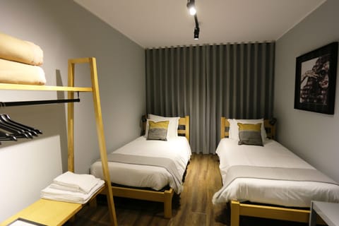 Twin Room, 2 Twin Beds, Shared Bathroom | Soundproofing, free WiFi, bed sheets