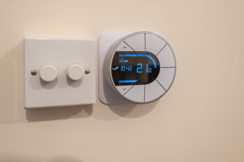 Dimmer switches and zoned hot water central heating 