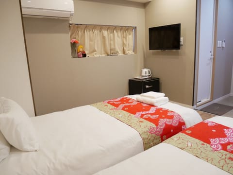 Twin Room | Blackout drapes, free WiFi, bed sheets