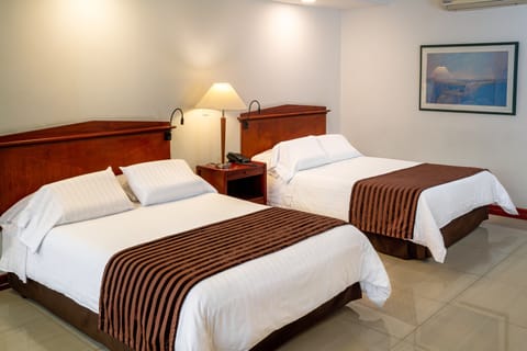 Executive Room, 2 Double Beds | Pillowtop beds, in-room safe, desk, blackout drapes