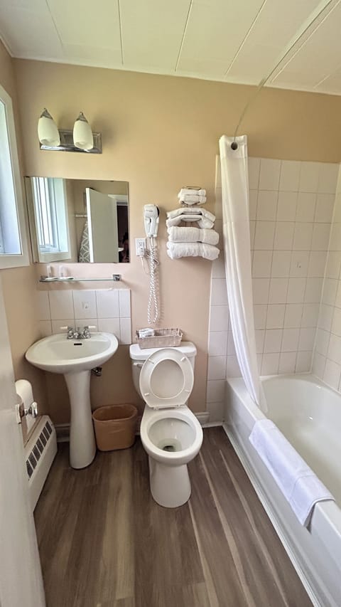 Rainfall showerhead, free toiletries, hair dryer, towels