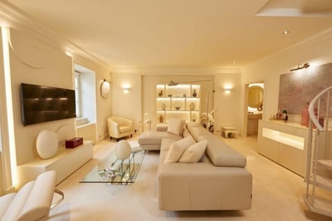 Design Apartment | Living area | Flat-screen TV, heated floors