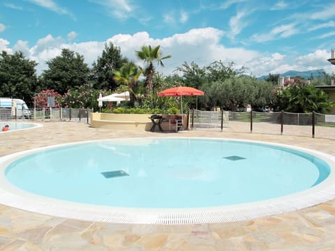 Cloud, Water, Sky, Property, Swimming Pool, Azure, Tree, Shade, Aqua, Plant