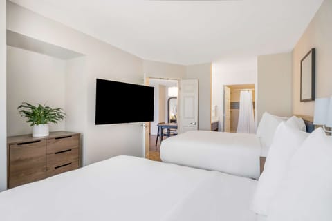 Suite, 2 Double Beds (One Bedroom) | Premium bedding, blackout drapes, iron/ironing board, free WiFi