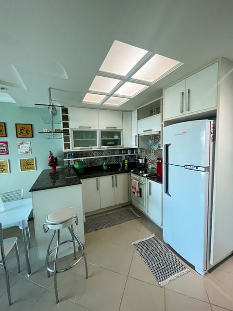 Family Apartment | Private kitchenette | Fridge, microwave, toaster, highchair