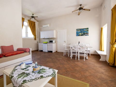 Furniture, Ceiling Fan, Decoration, Table, Picture Frame, Interior Design, Wood, Floor, Living Room, Flooring