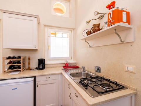 Countertop, Cabinetry, Property, White, Gas Stove, Kitchen Appliance, Kitchen, Kitchen Stove, Cooktop, Home Appliance