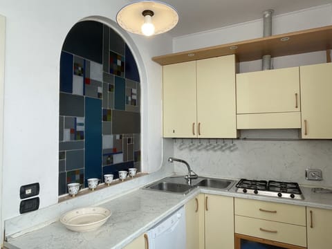 Table, Furniture, Property, Countertop, Tableware, Cabinetry, Food, Plant, Window, Chair