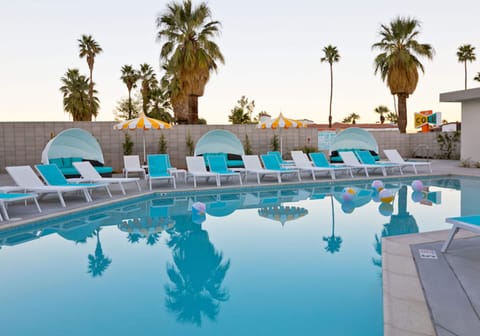 Outdoor pool, free cabanas, pool umbrellas