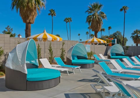 Outdoor pool, free cabanas, pool umbrellas