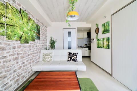 Design Apartment (304) | Living area | Flat-screen TV