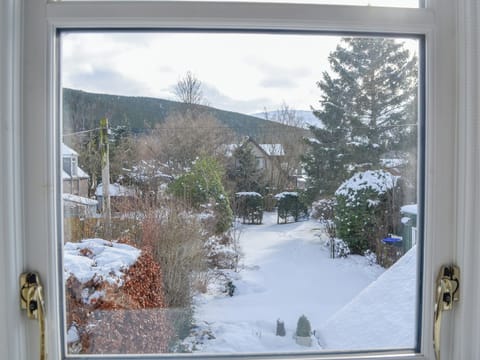 Bedroom overlooking the rear garden and hills beyond | Craigclunie, Ballater