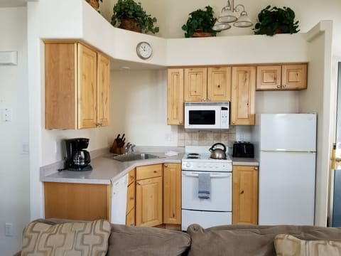 Traditional Condo | Private kitchen | Fridge, microwave, oven, stovetop