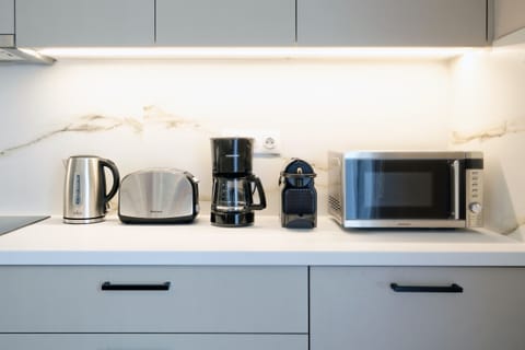 Superior Apartment, 4 Bedrooms, Balcony | Coffee and/or coffee maker