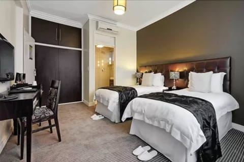 Deluxe Room | In-room safe, individually decorated, desk, iron/ironing board