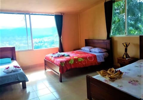 Standard Triple Room, Multiple Beds, Mountain View | Laptop workspace, free WiFi, bed sheets