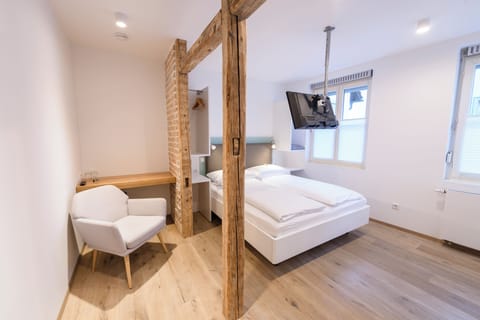 Classic Double Room | Minibar, individually decorated, individually furnished