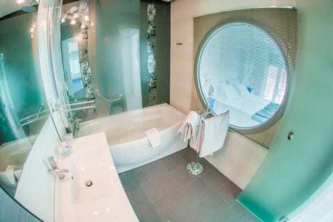 Superior Suite | Bathroom | Hair dryer, towels, soap