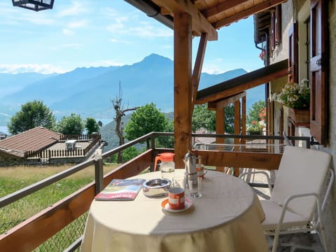 Sky, Table, Property, Furniture, Cloud, Chair, Plant, Building, Tableware, Flowerpot