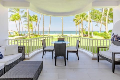 Veranda Escape: Savor ocean views from this stylish terrace, your tropical retreat awaits!