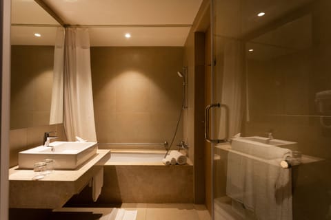 Suite, 1 Queen Bed, Bathtub (Two Bay) | Bathroom | Shower, hydromassage showerhead, hair dryer, slippers