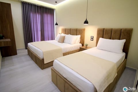 Triple Room (extra twin bed) | Minibar, desk, soundproofing, free WiFi