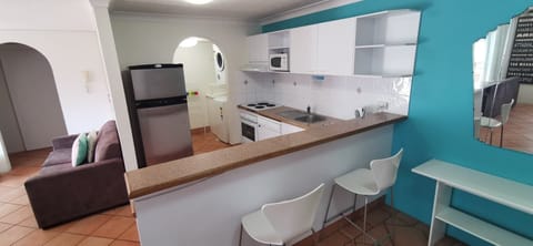 Apartment, 2 Bedrooms | Private kitchen | Fridge, microwave, stovetop, electric kettle