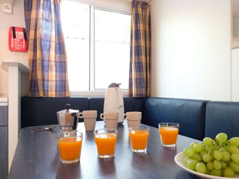 Tableware, Food, Property, Window, Table, Orange, Interior Design, Couch, Curtain