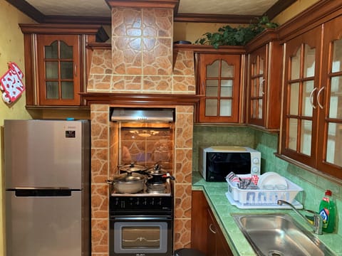 Family Suite | Private kitchen | Full-size fridge, microwave, oven, toaster