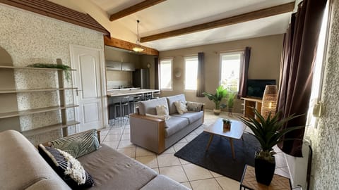 Superior Apartment, 2 Bedrooms | Living area | 50-cm flat-screen TV with cable channels, TV