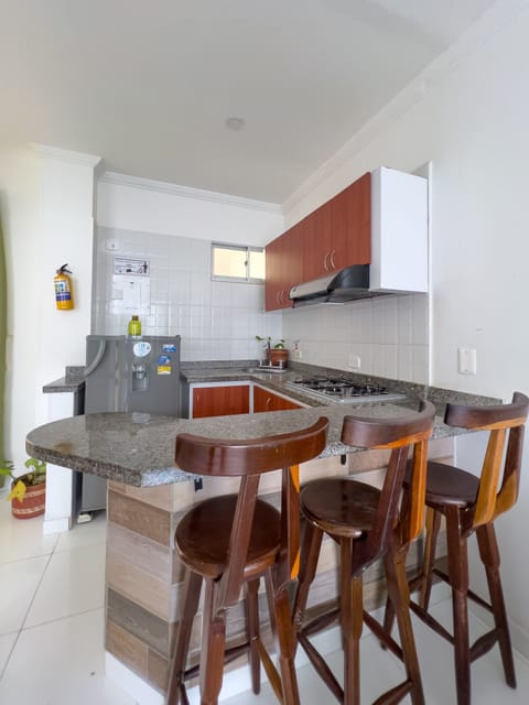 Standard Apartment (405) | Private kitchen | Full-size fridge, stovetop, dishwasher, coffee/tea maker