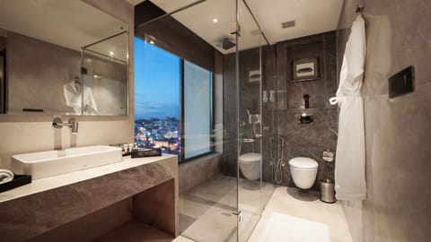 Signature Suite | Bathroom | Shower, rainfall showerhead, free toiletries, bathrobes