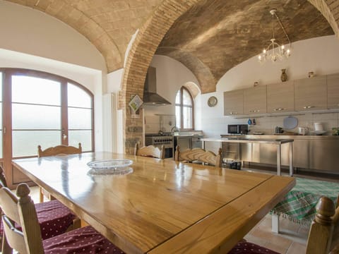 Table, Property, Furniture, Countertop, Wood, Cabinetry, Kitchen, Chair, Interior Design, Lighting