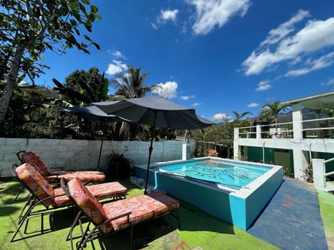 Outdoor pool, pool umbrellas, sun loungers