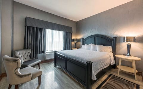 Suite with King Bed & Living Room | Premium bedding, pillowtop beds, desk, blackout drapes