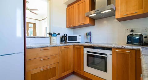 Apartment | Private kitchen | Full-size fridge, microwave, oven, stovetop