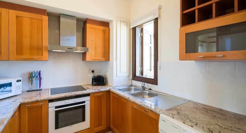 Apartment | Private kitchen | Full-size fridge, microwave, oven, stovetop