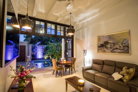 Exclusive Villa, 1 Bedroom | Living area | 40-inch LCD TV with cable channels, TV