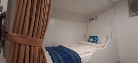 Standard Shared Dormitory, Women only, Pool View | Free WiFi, bed sheets